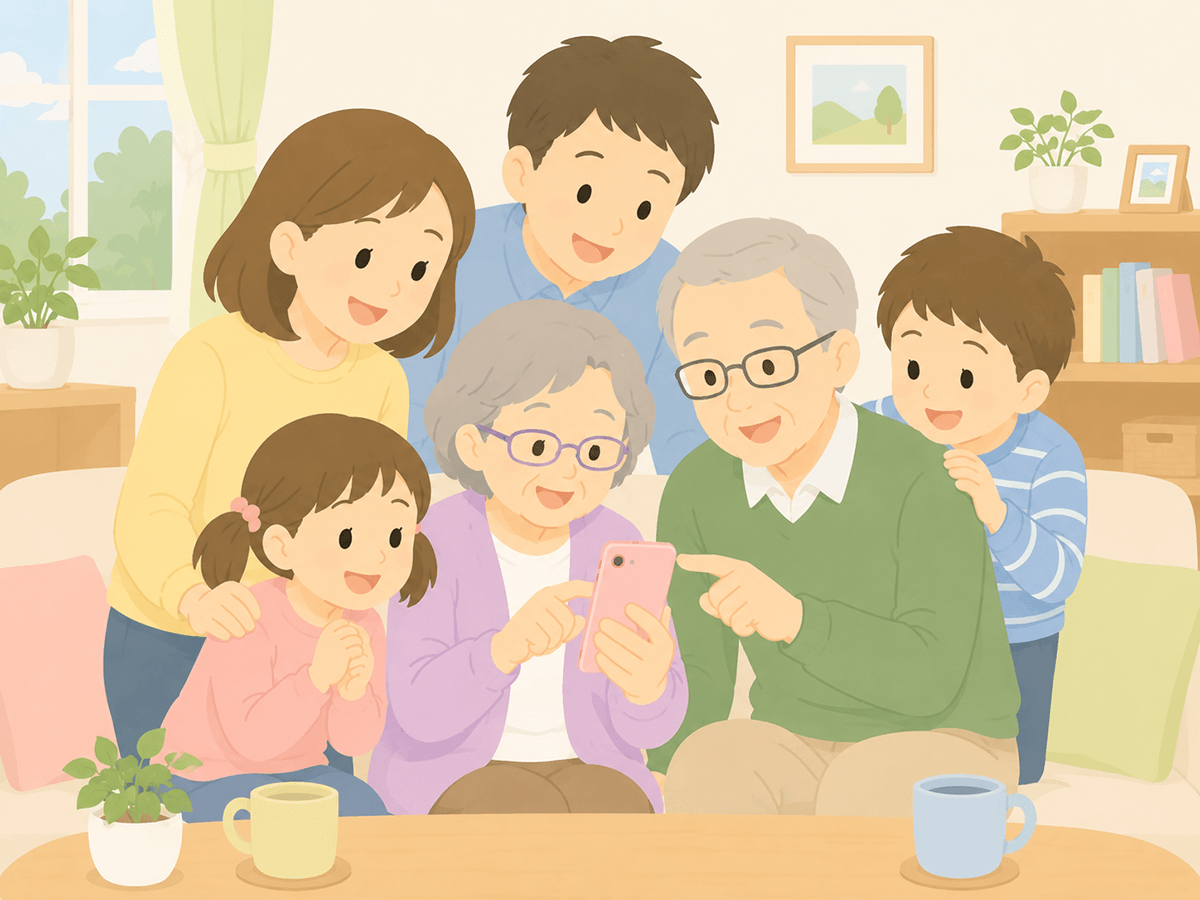 日本人の家族がリビングでスマホを見ている様子